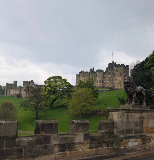 Alnwick Castle from the Lion Bridge across the River Aln